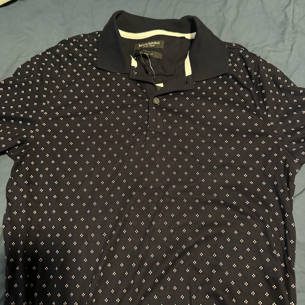 A pattern navy blue polo shirt
